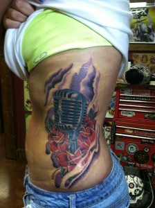 sexy_girly_hot_feminine_microphone_and_roses_color_rib_tattoo_david_meek_tucson_arizona