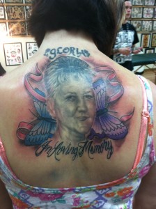 realistic_black_and_grey_memorial_portrait_with_butterfly_and_ribbon_tattoo_david_meek_tattoos_true_til_death_tattoo_company_ashtabula_ohio_tattoo_shops