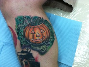 scary_creepy_custom_realistic_traditional_halloween_jackolantern_illustrative_tattoo_david_meek_tattoos_true_til_death_tattoo_company_ashtabula_ohio
