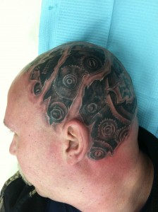 custom_black_and_grey_gear_head_skin_rip_tear_head_tattoo_david_meek_tattoos_true_til_death_tattoo_company_ashtabula_ohio