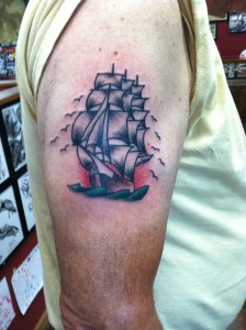 traditional ship tattoo, arm tattoo, tough guy tattoos, tucson tattoo artist, tattooer, fast lane tattoo, david meek tattoos, tattoo art, brooklyn pete, tattooed men, keith b machine works, eternal ink, kingpin tattoo supply, bishop rotary