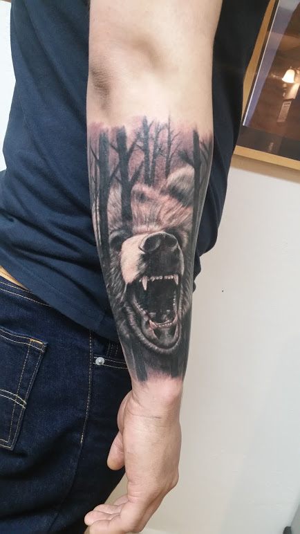 Black and Grey realistic realism roaring bear half sleeve arm tattoo by david meek best tattoo artist tucson arizona