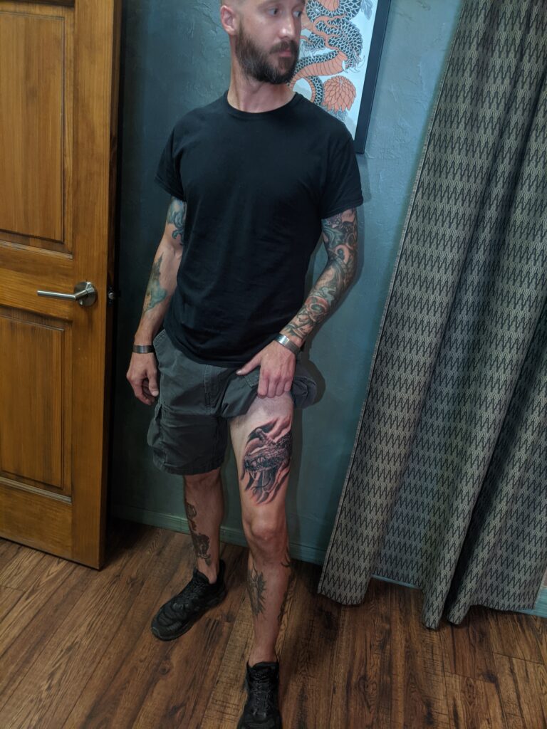 Black and Grey Realistic Diamondback Rattlesnake Leg Tattoo by David Meek of Art and Sol Tattoo in Tucson Arizona